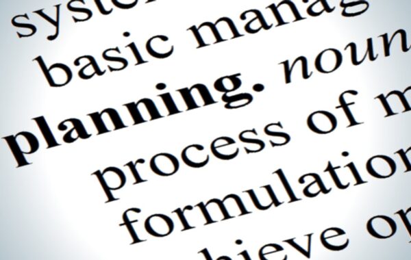 Close-up of a dictionary definition for the word 'planning'