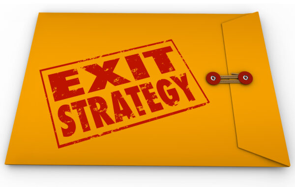 Yellow envelope stamped with 'Exit Strategy' in red ink