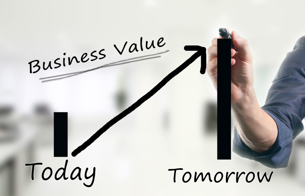 Hand drawing a rising bar chart labeled 'Business Value' from Today to Tomorrow