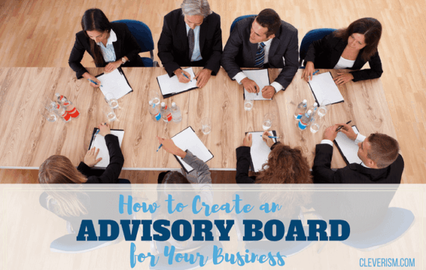 Overhead view of a business advisory board meeting around a conference table